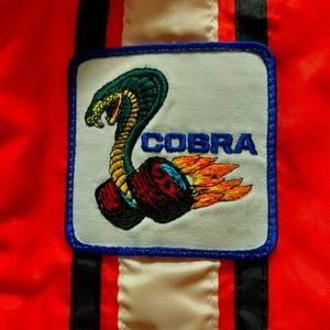 1960s Vintage Ford Shelby Cobra Racing Jacket. Color: Competition Orange